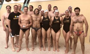 Team photo with men and women and coach