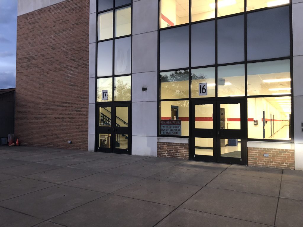 Outside of the school building and door 16