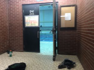 Open door to entry to the swim pool.